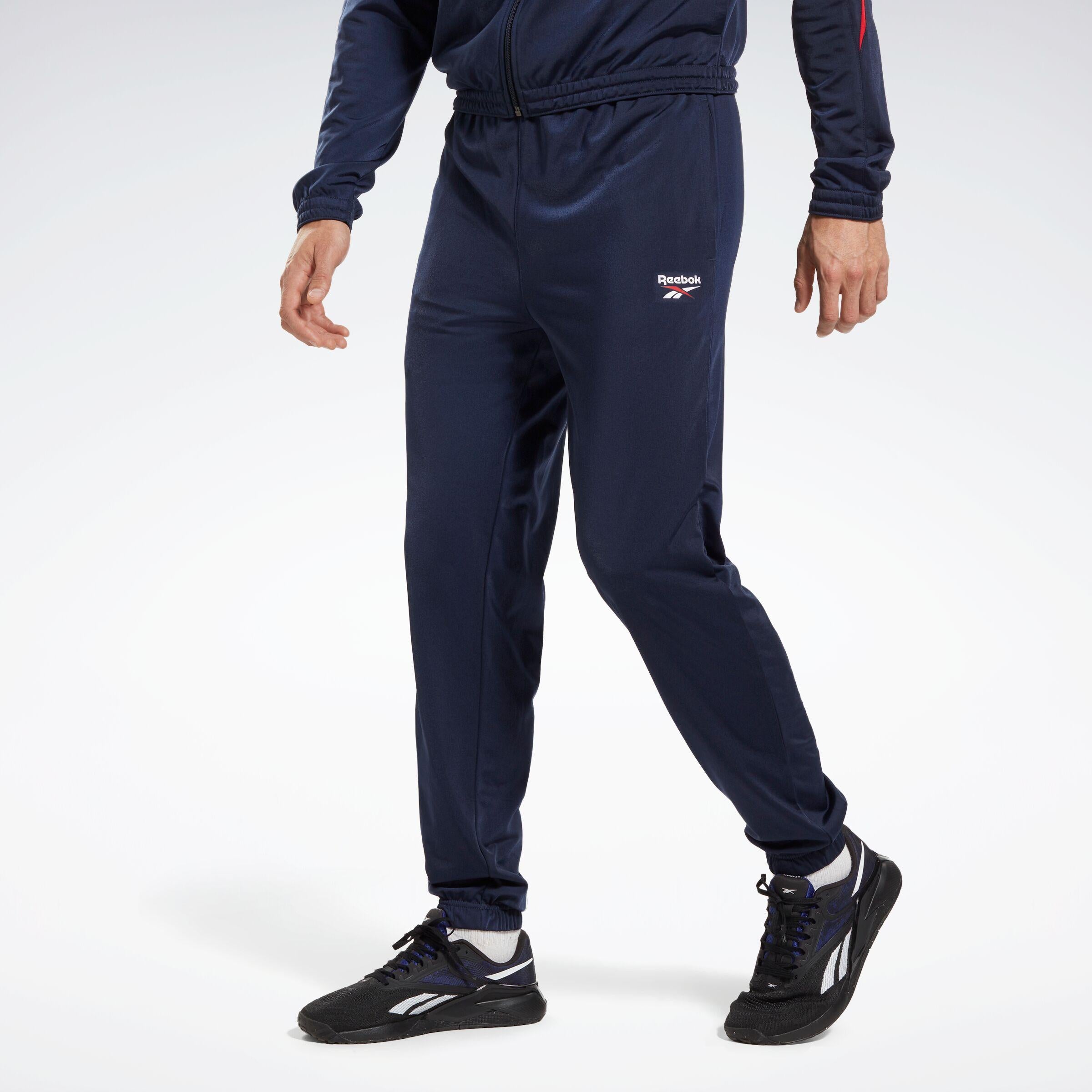 Reebok Apparel  Unisex' Reebok Id Vector Knit Trackpant Reebok Training App Men Blue Reg