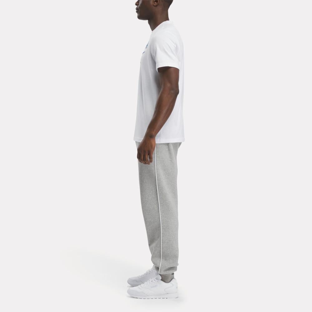 Reebok Apparel  Men's Reebok Identity Stacked Logo T-Shirt Reebok Training App Men White Reg