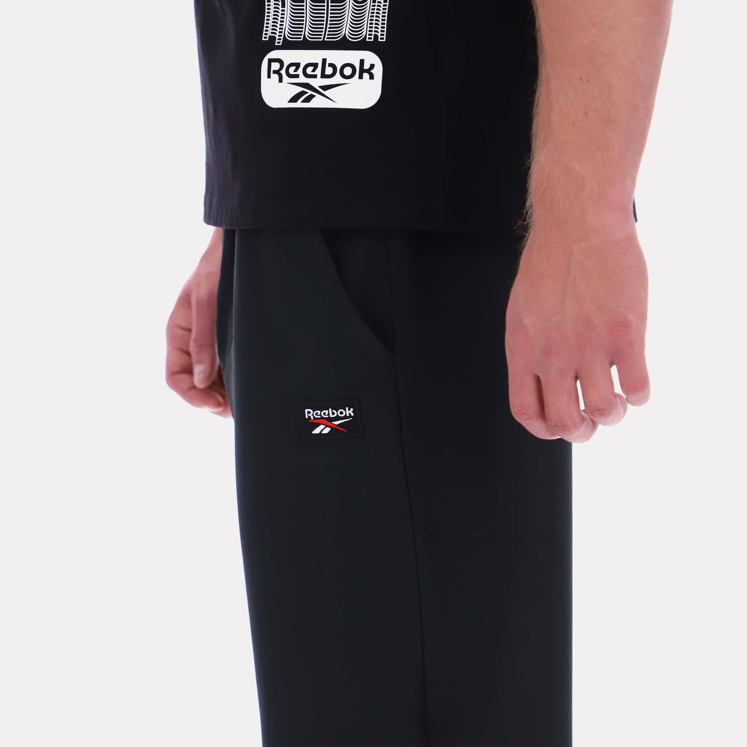 Reebok Apparel  Men's Reece 4Way Stretch Pant Reebok Classics App Men Black Reg