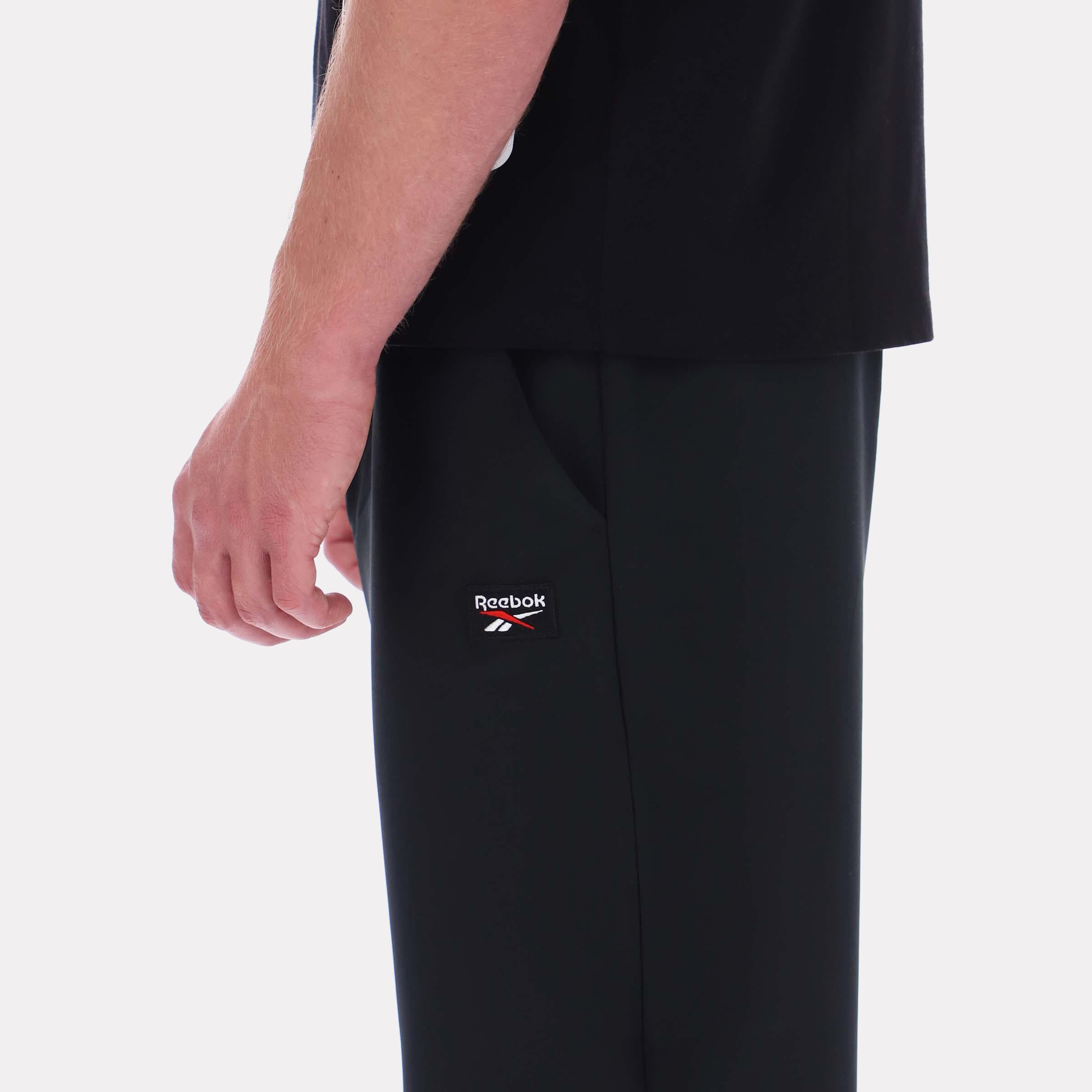 Reebok Apparel  Men's Reece 4Way Stretch Pant Reebok Classics App Men Black Reg