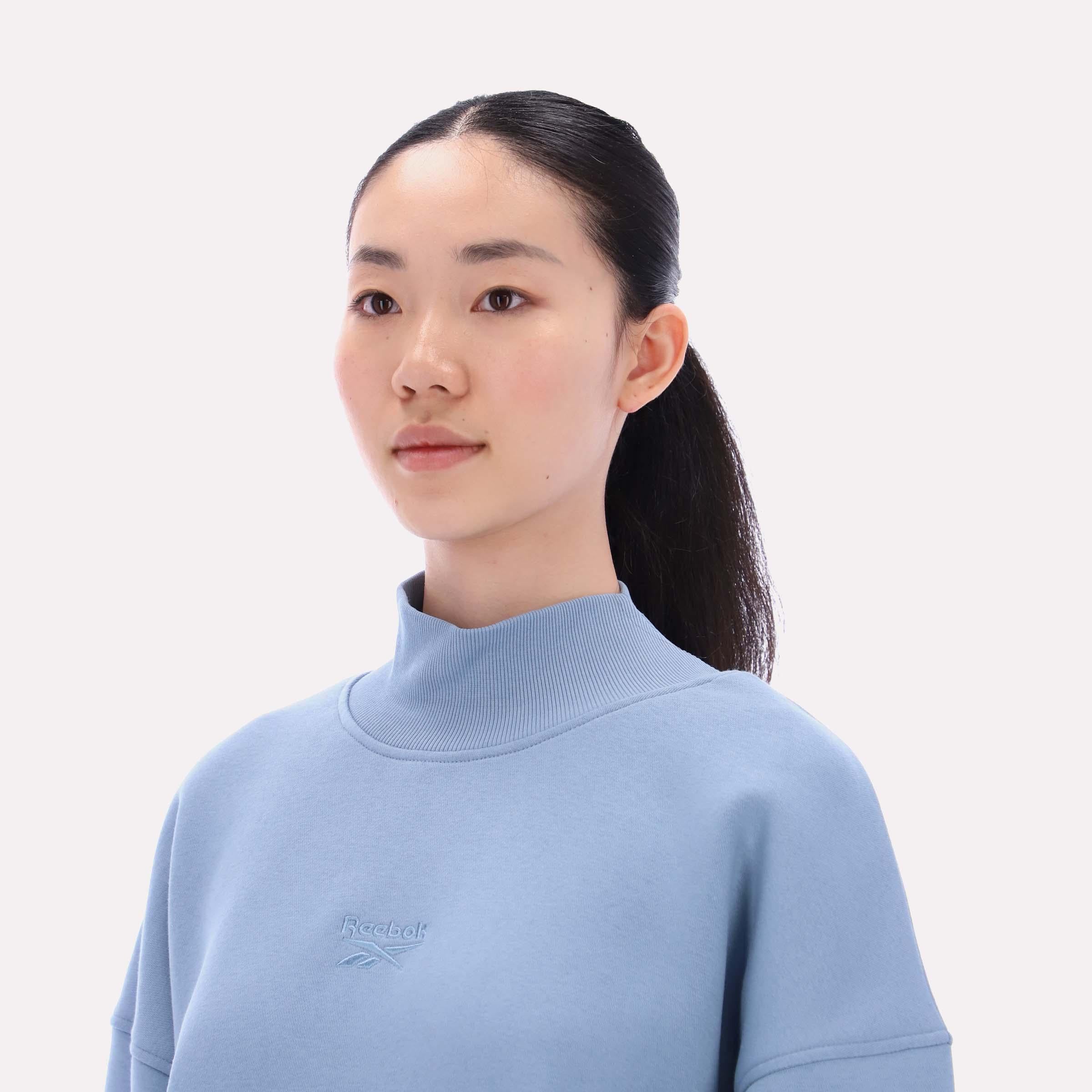 Reebok Apparel  Women's Harper Longline Roll Neck Sweatshirt Reebok Classics App Women Blue Reg