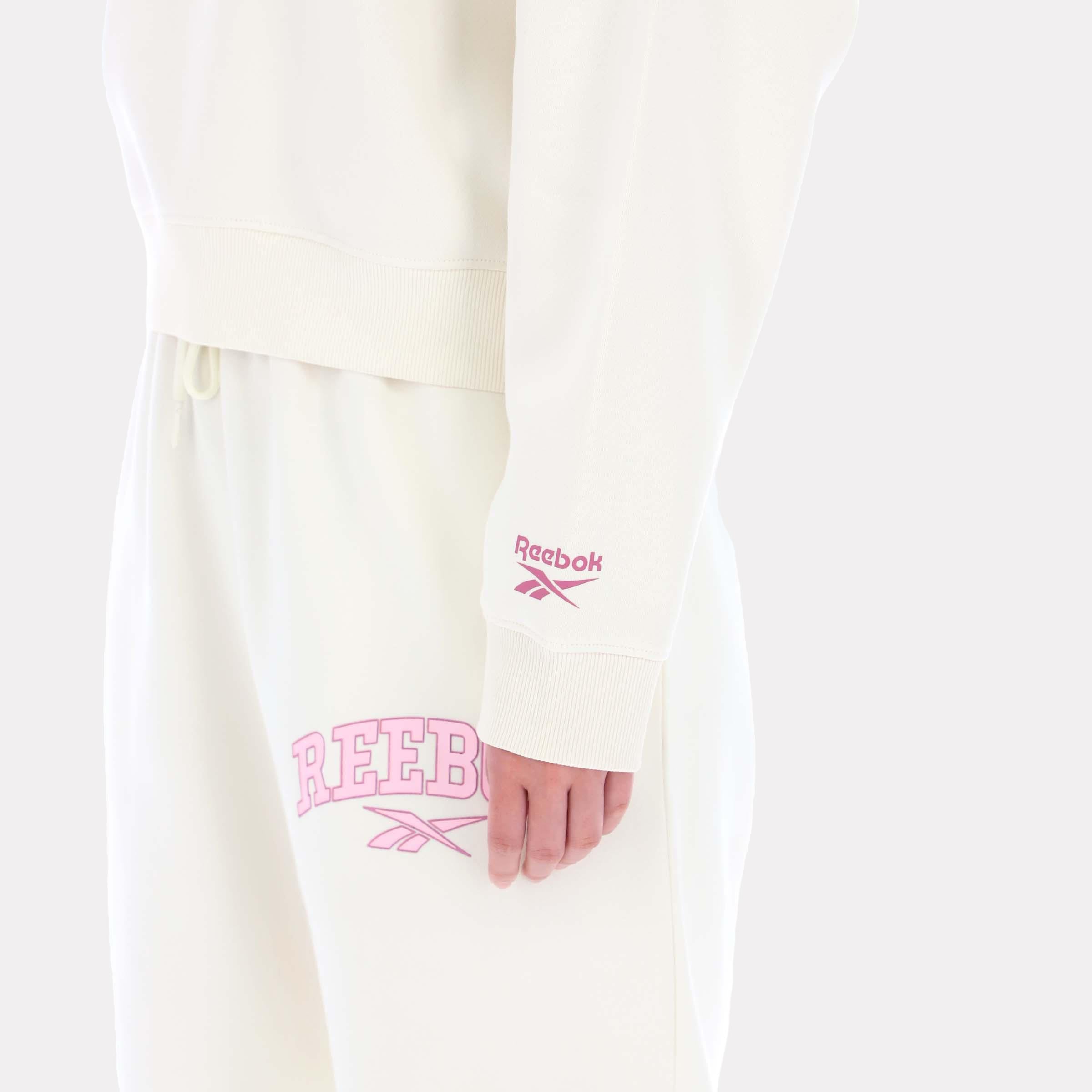 Sweat à capuche universitaire Shekira pour femme de Reebok Apparel, Reebok Classics App, blanc, modèle standard.