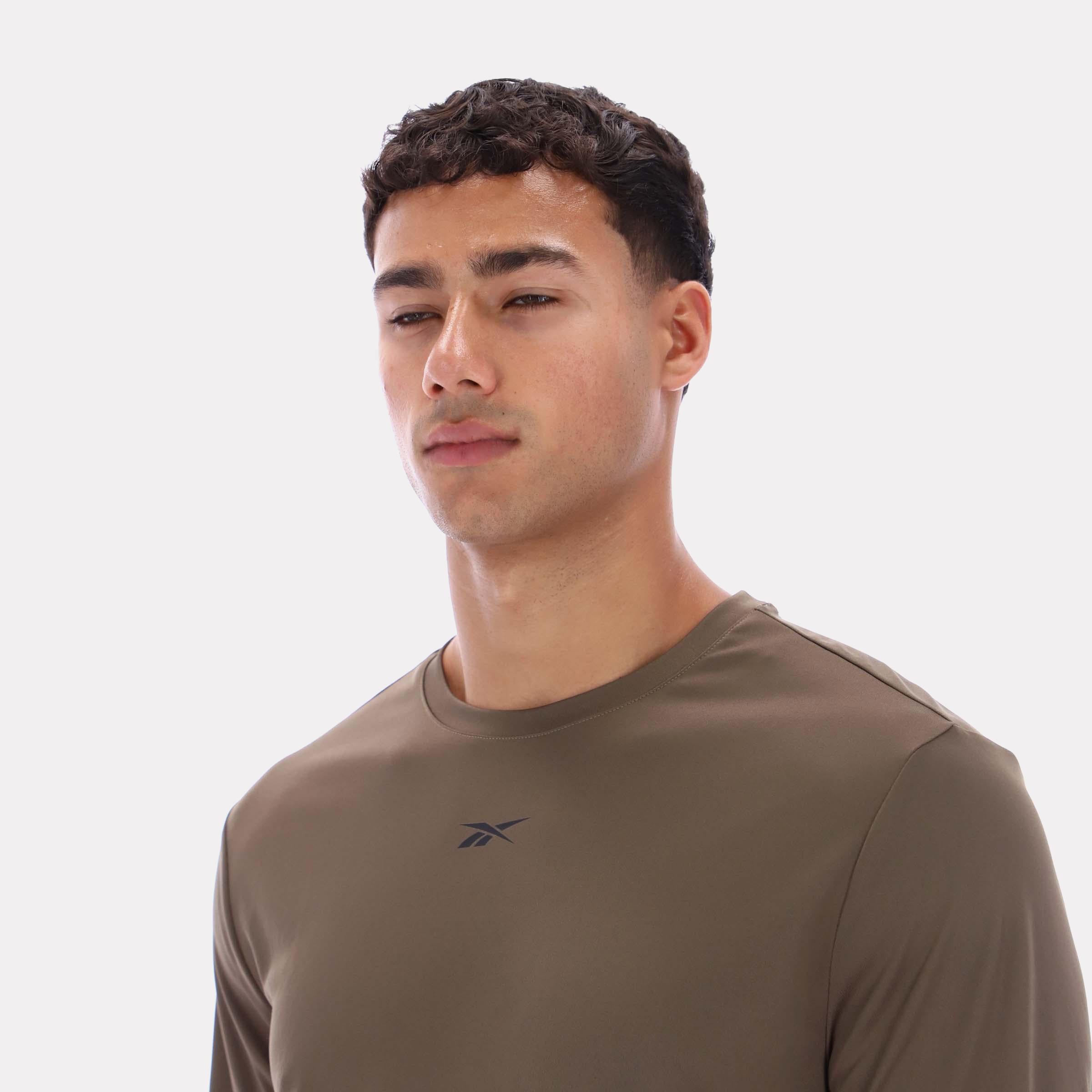 T-shirt technique Reebok pour homme, modèle ID Train LS, bleu standard.