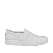 White slip-on sneaker shoe on white background
