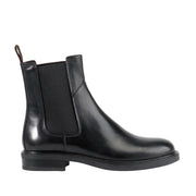 black leather chelsea boot on a white background