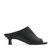 Black leather mule sandal with peep-toe, and kitten heel. 