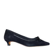 black suede stitch-trim pump with a bow detail on a white background