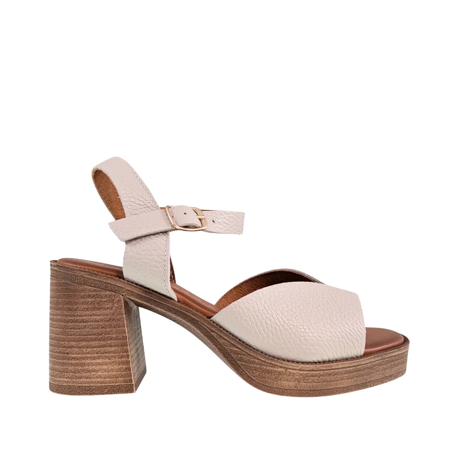 Cream leather platform sandal with a block heel and adjustable straps. 