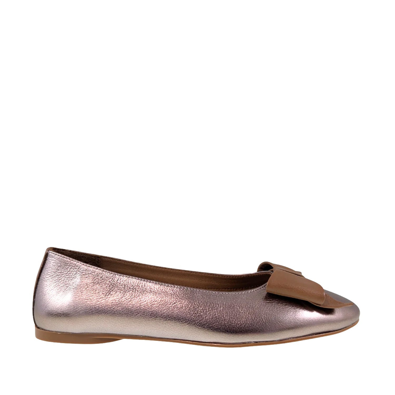 Metallic flat shoe with a bow on a white background