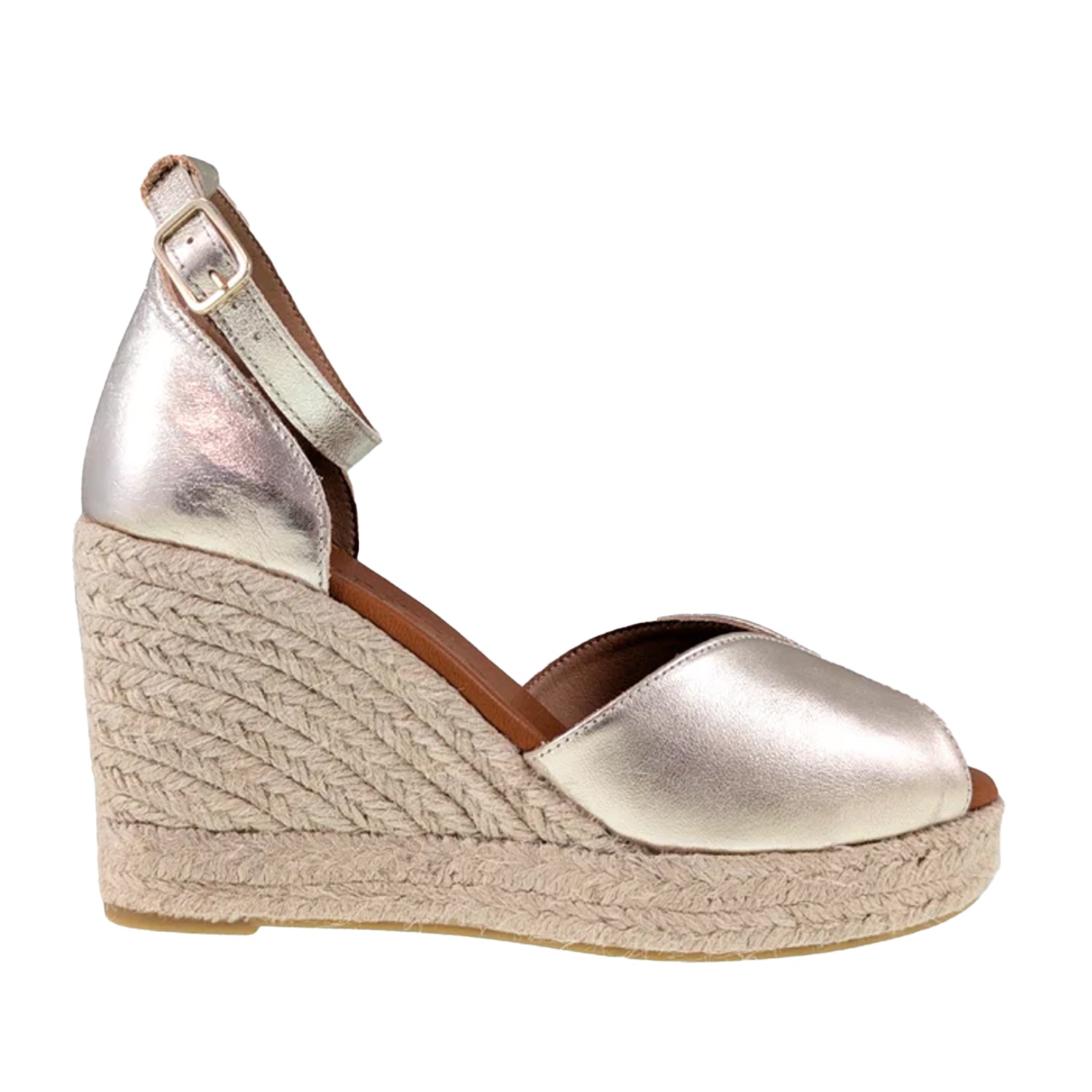 Gold leather espadrille wedge sandal with ankle strap. 