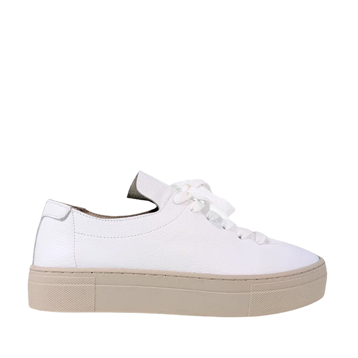 White sneaker with a beige platform sole on a white background