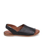 Black leather slingback sandal with peep toe on a white background
