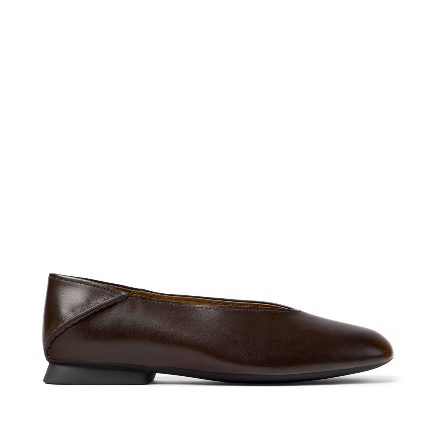 brown ballet flats on a white background