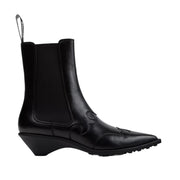 black cowboy chelsea boot with 3D toe detailing on a white background