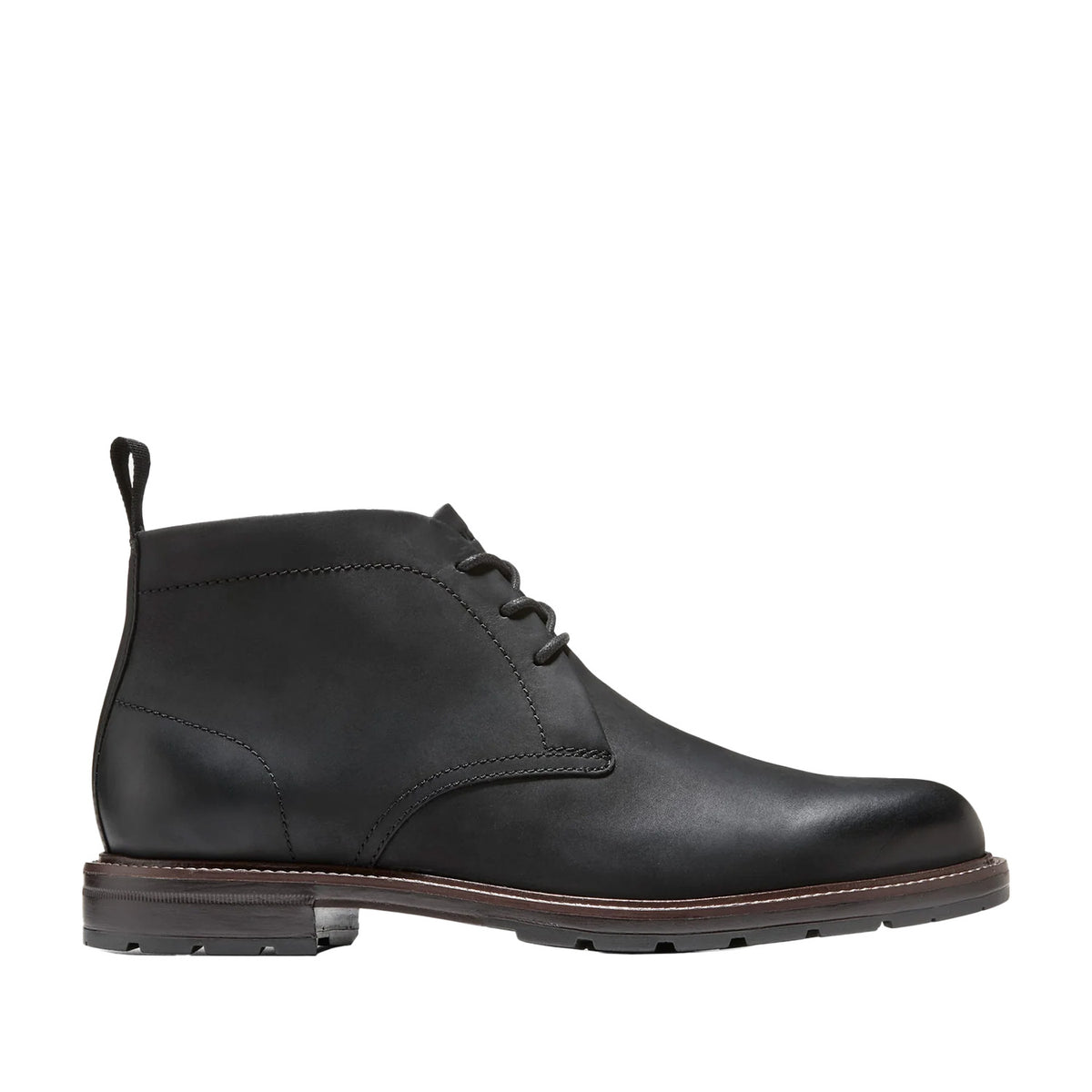 black lace-up chukka boot on a white background