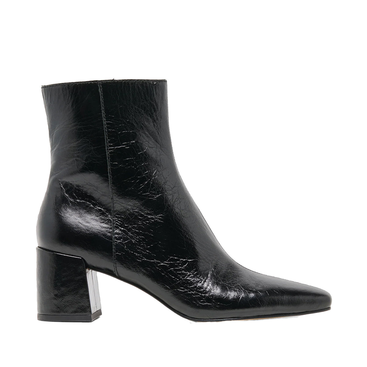 black heeled patent leather ankle boot on a white background