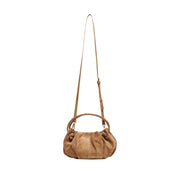 tan suede pouch bag with black braided leather top handle and crossbody strap on a white background