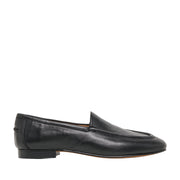 black leather loafer on a white background