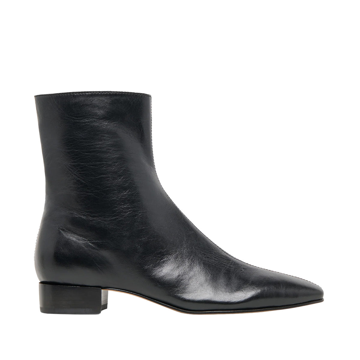 black heeled leather ankle boot on a white background