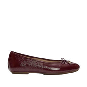 burgundy ballet flat on white background