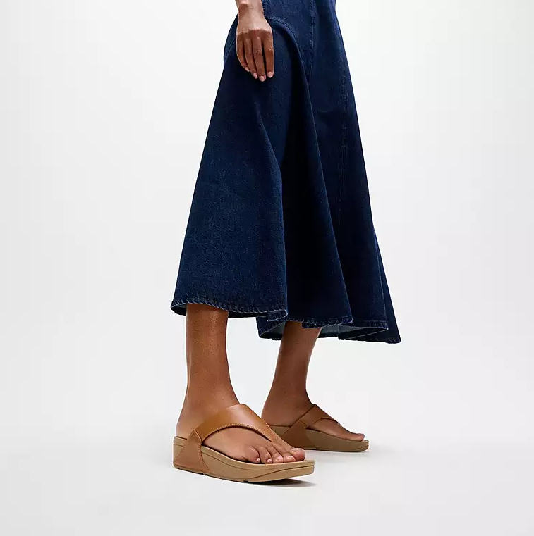 Tan brown platform toe-post flip flop sandal. 