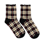 Plaid patterned socks on a white background