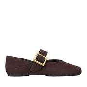 Brown suede mary-jane with an adjustable oversized buckle detail on a white background 