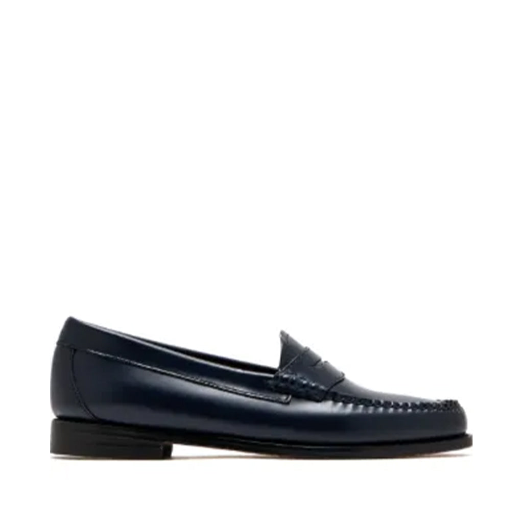 Navy blue loafer shoe on a white background