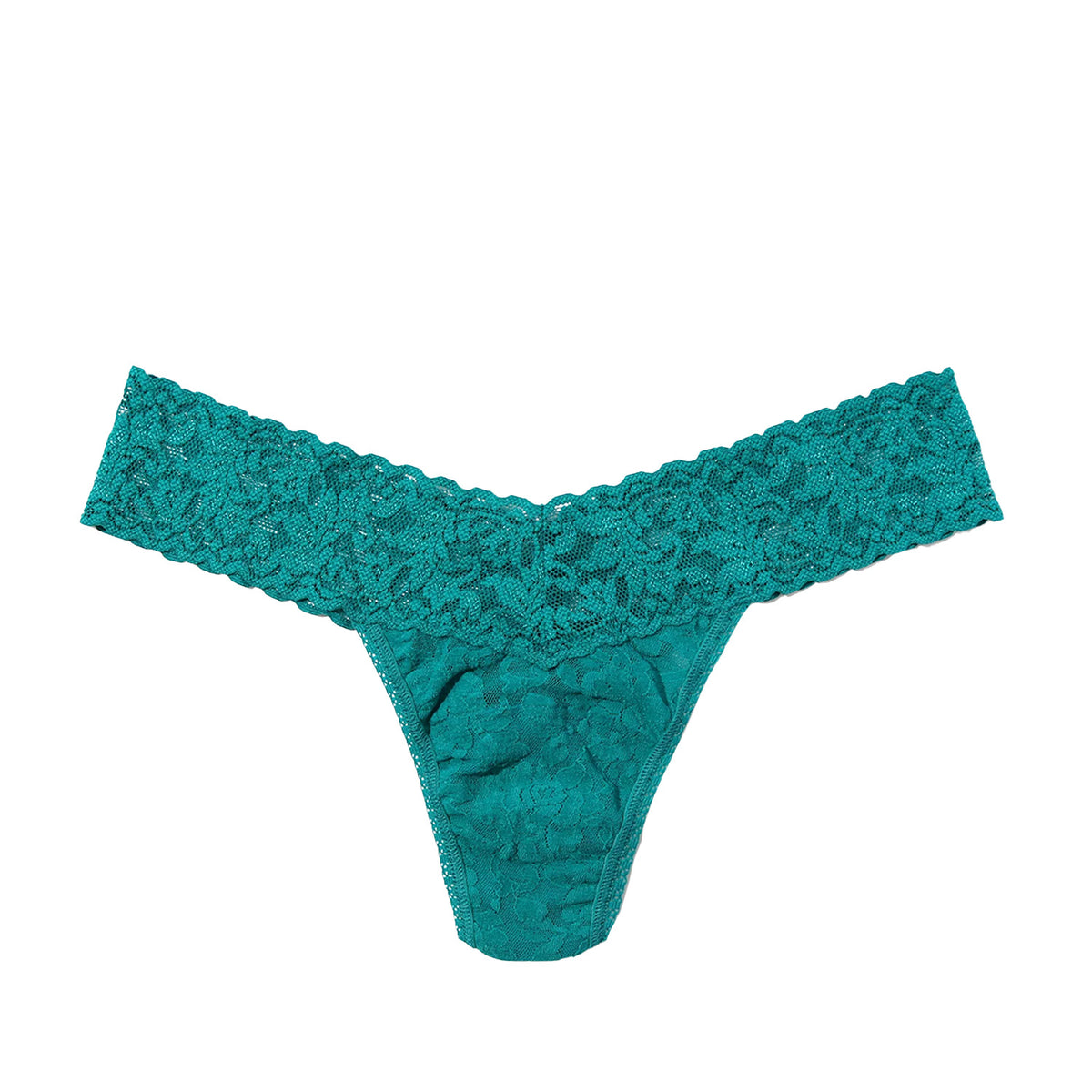 green lace thong on a white background