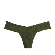green lace thong on a white background