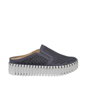 Navy slip-on shoe with a textured sole on a white background