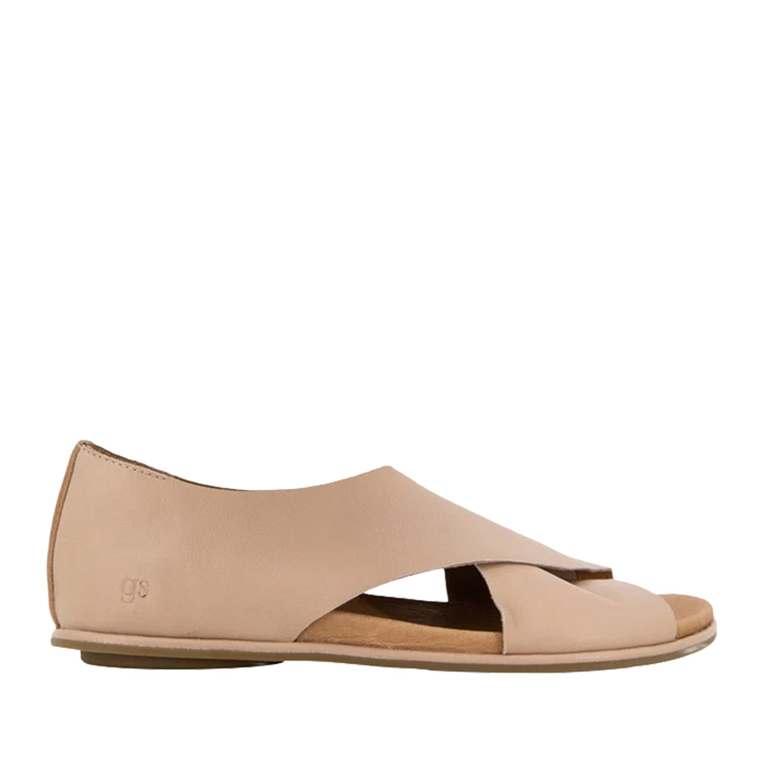 Light brown leather flat sandal with a crossover strap and a peep-toe. 