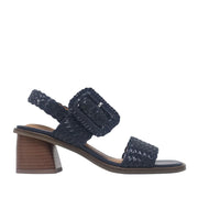 Navy blue woven leather sandal with oversized adjustable buckle and block heel.