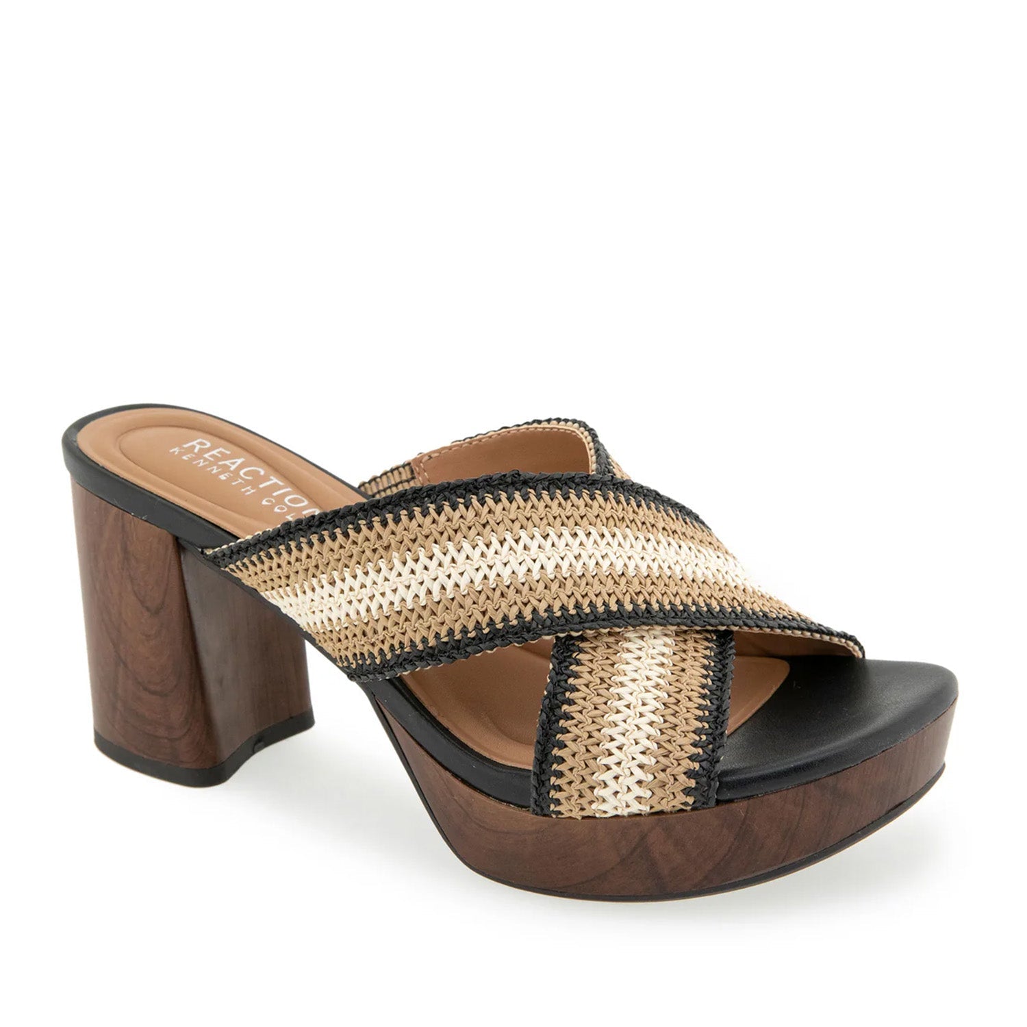 Brown and black platform clog sandal with a crisscross woven striped strap. 