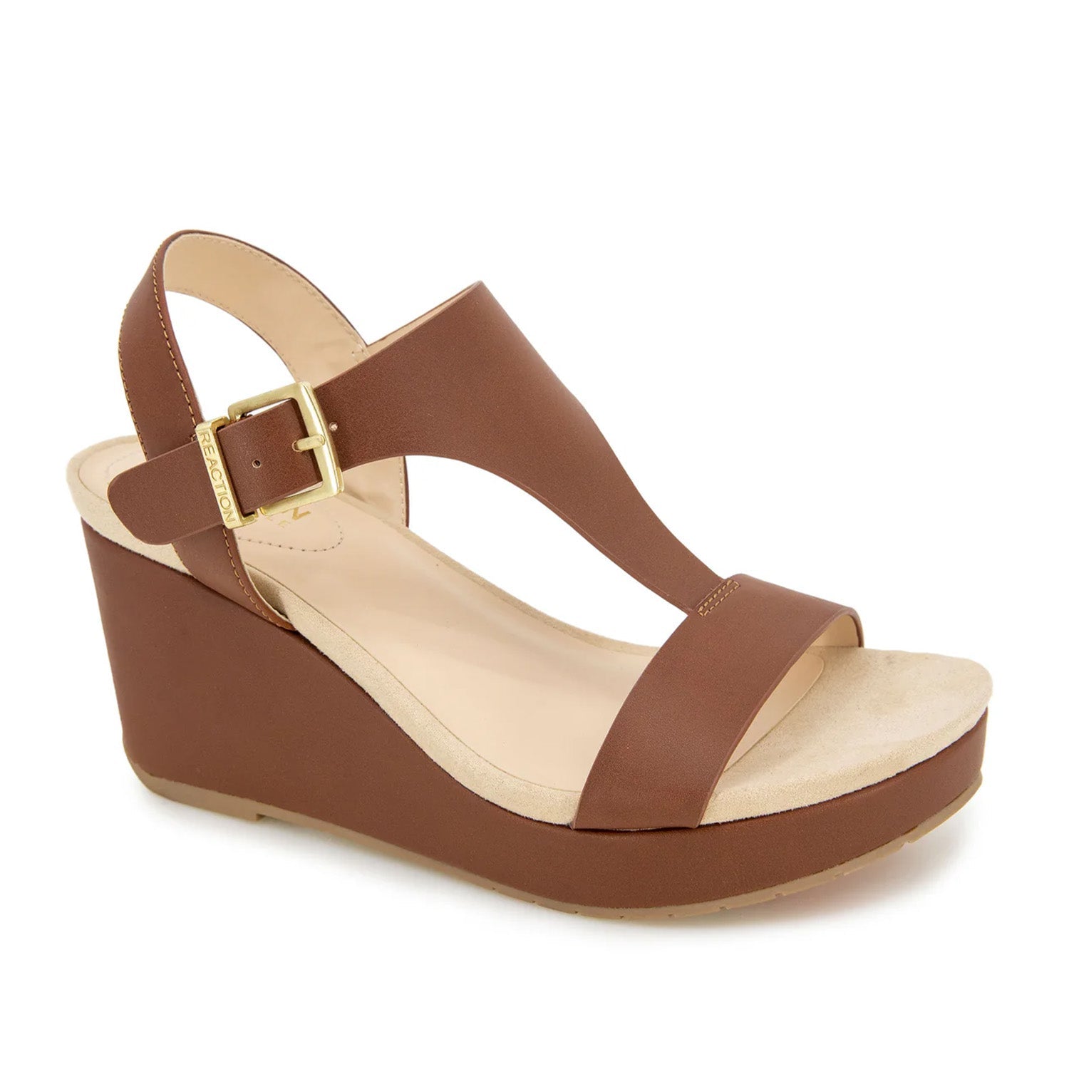 Brown leather espadrille wedge sandal with a t-strap, and ankle buckle. 