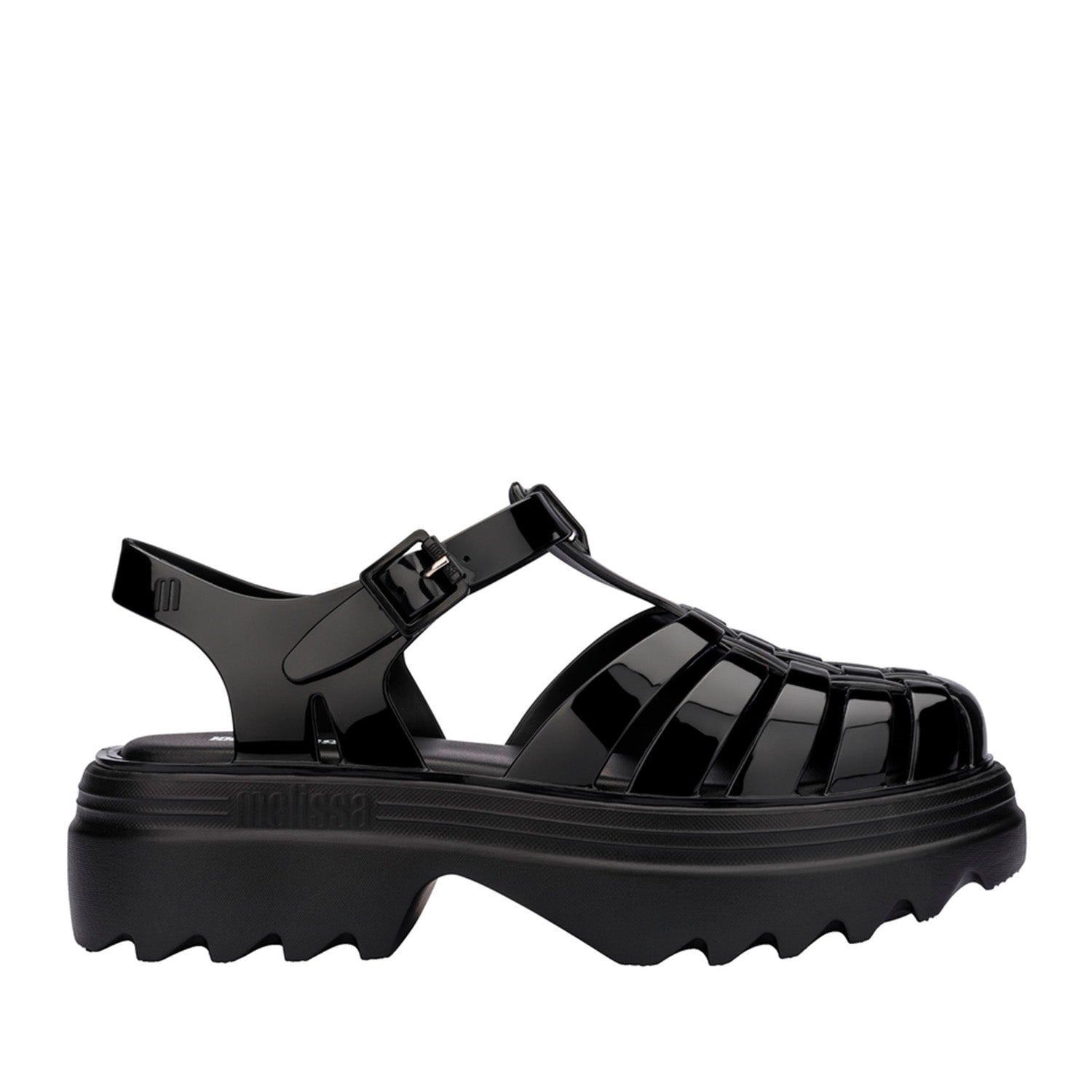 Black platform sandal on a white background