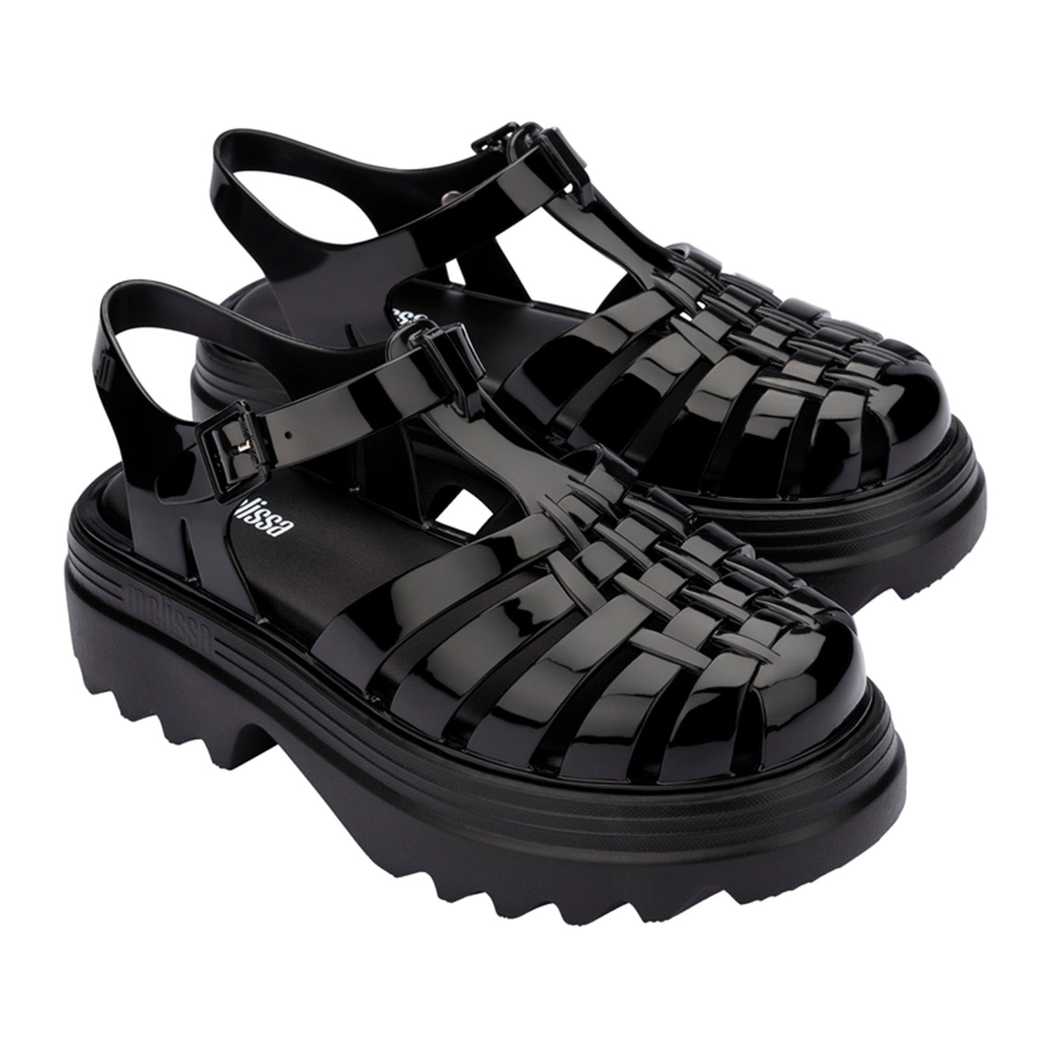Black platform jelly sandal on a white background