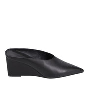 Black wedge heel with a pointed toe on a white background.