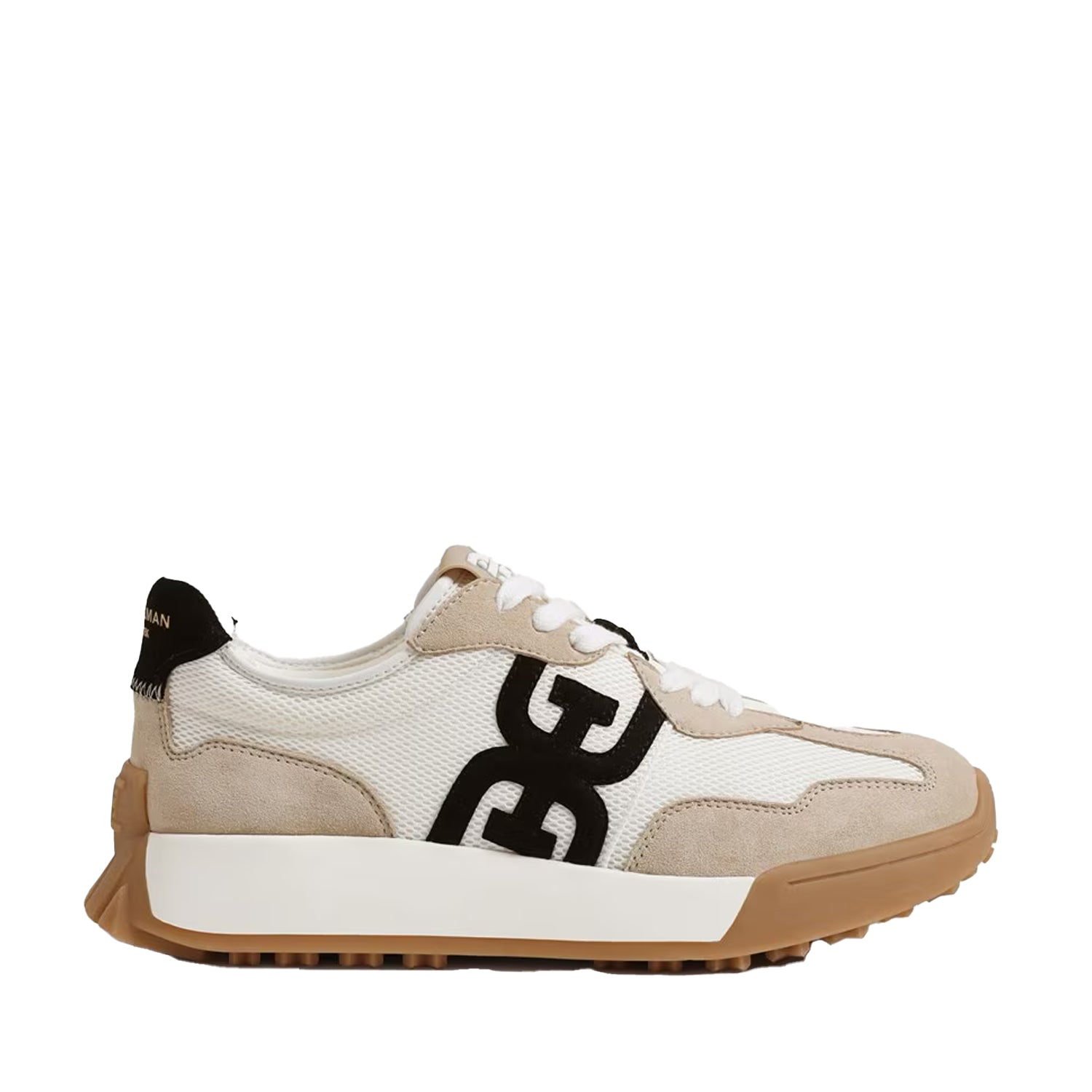 Beige and white sneaker with black logo on a white background