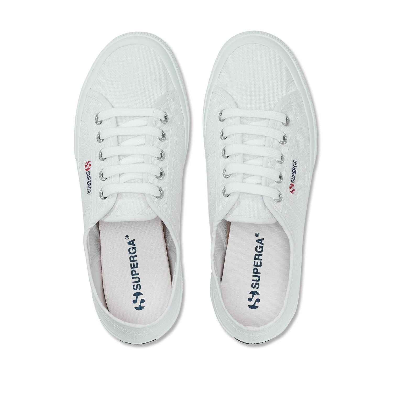 White lace-up canvas sneaker with white sole on white background