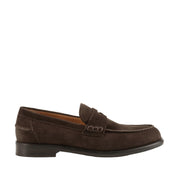 dark brown suede penny loafer on a white background