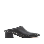 black leather studded mule heel on a white background