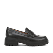 black lug sole leather penny loafer on a white background