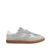 Gray sneaker with white sole on a white background