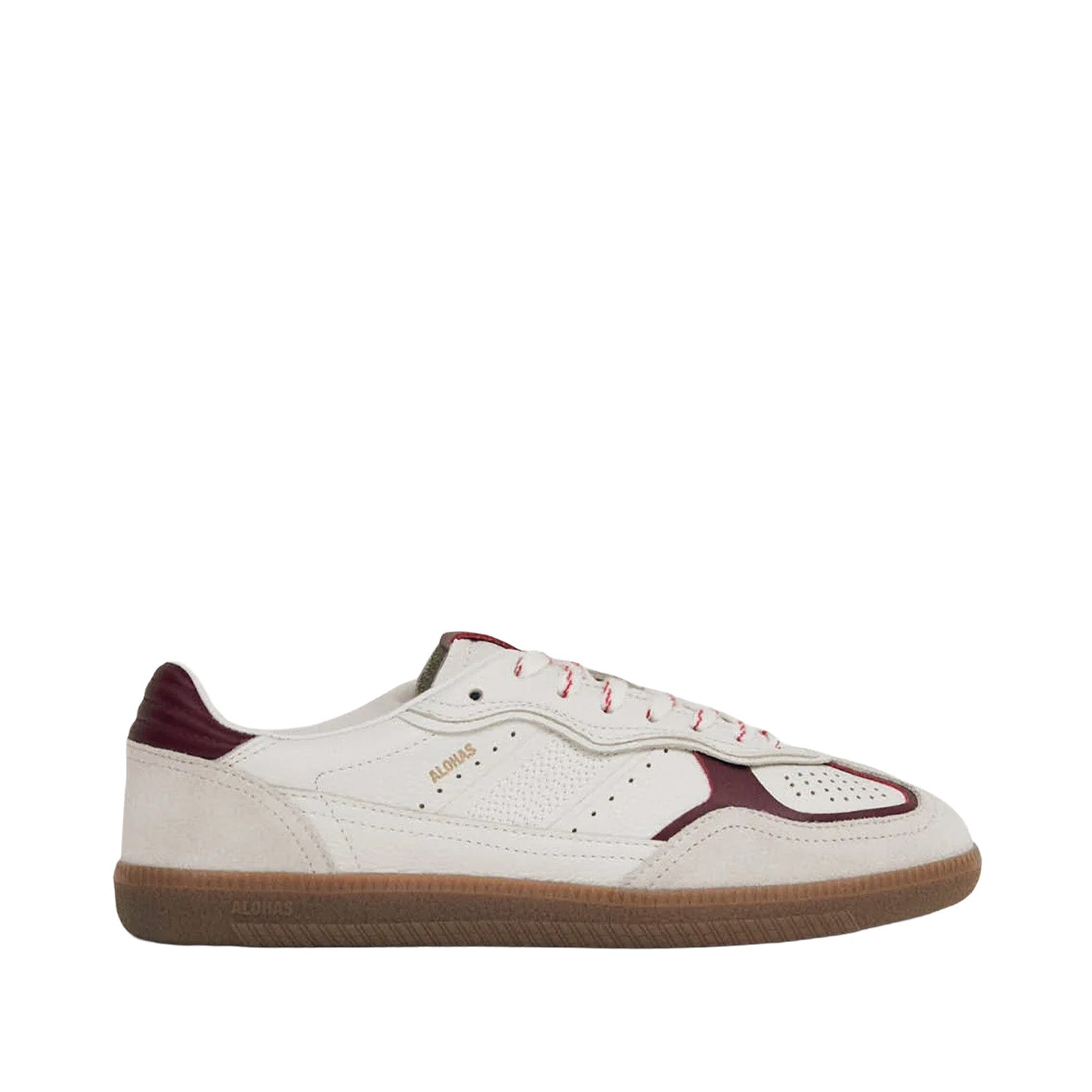 White sneaker with maroon accents on a white background