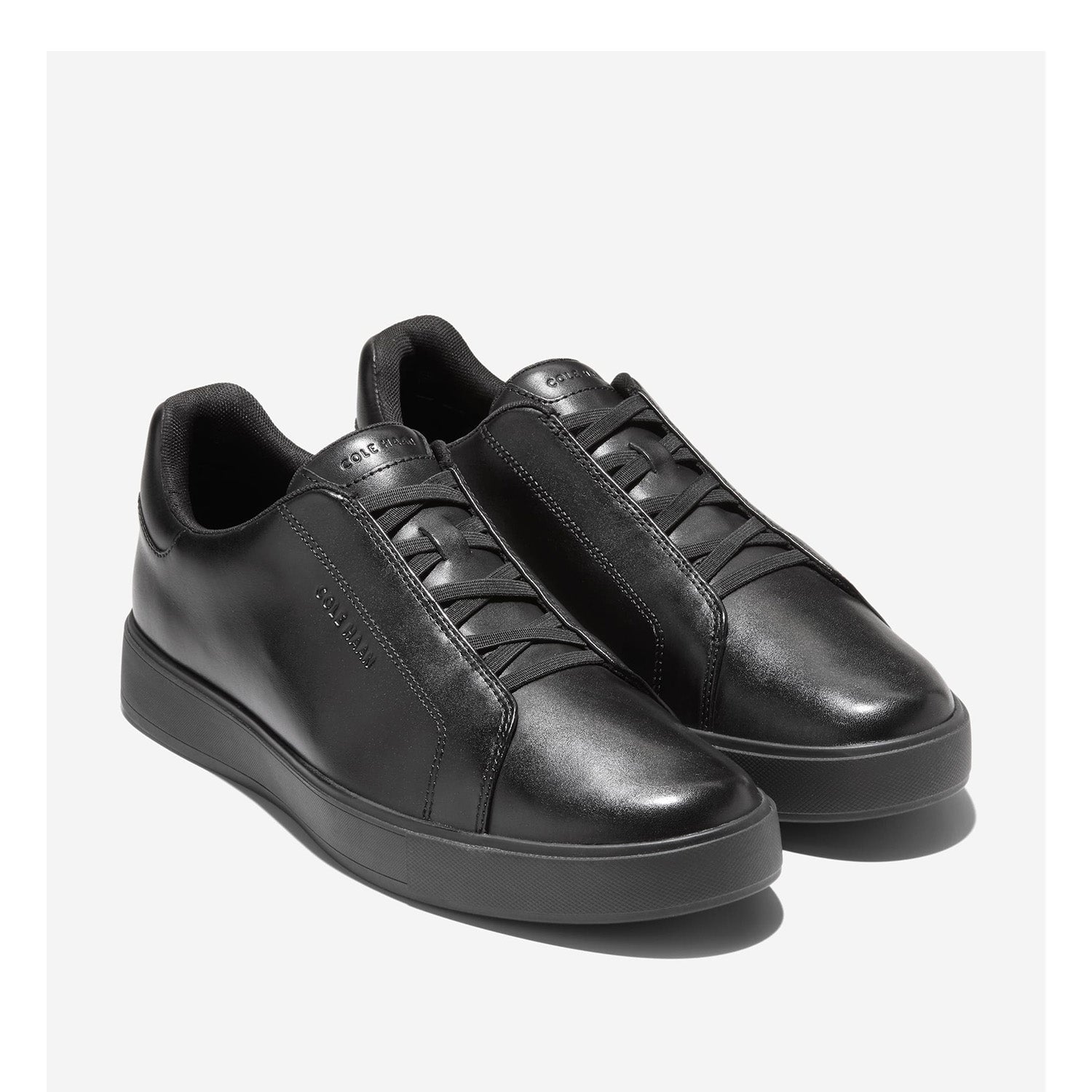 Baskets slip-on Cole Haan Grandpro Luxe pour homme, noires.