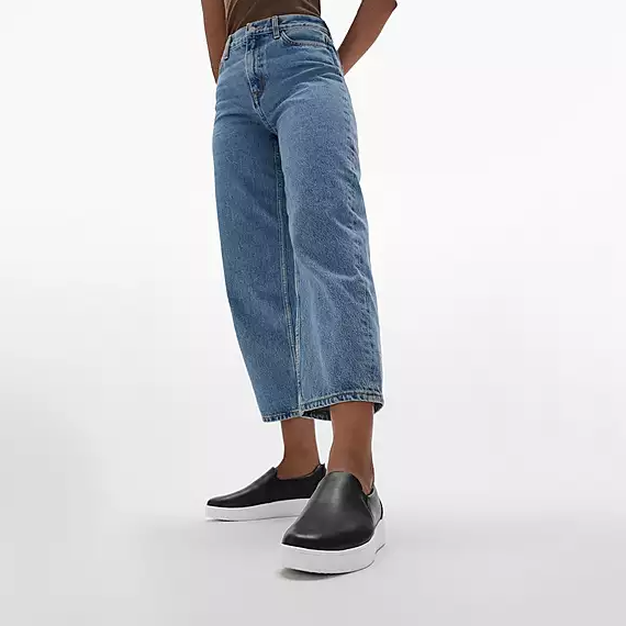 Black leather slip-on sneaker with white sole.