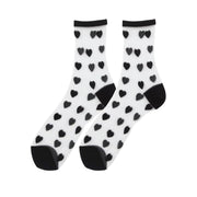 Chaussettes transparentes FLOOF à motif cœur noir