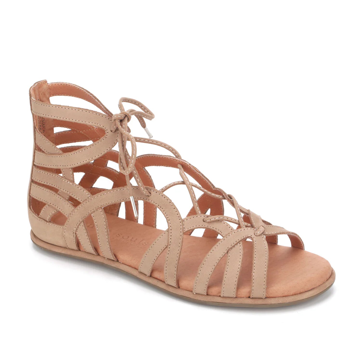 Beige matte leather gladiator flat sandal with a lace-up detail. 