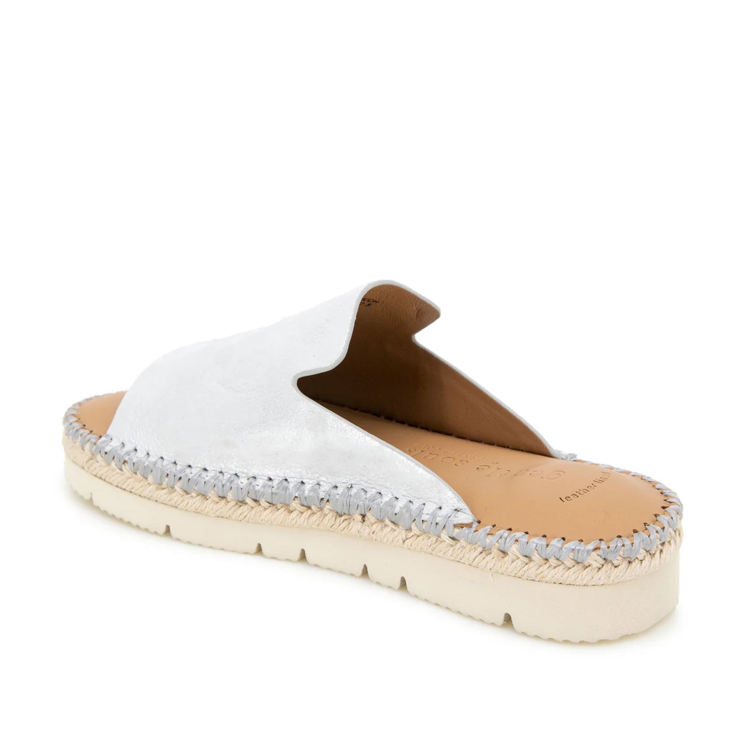 Silver metallic leather espadrille flatform mule with a peep toe. 
